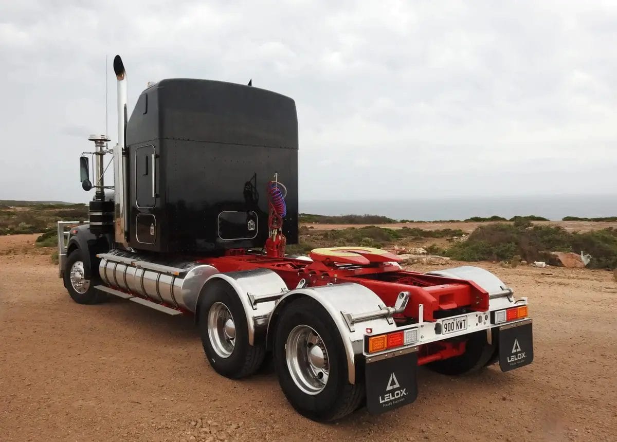 Australian-Truck-with-Lelox-Mudguards-on-a-Dirt-Road.webp